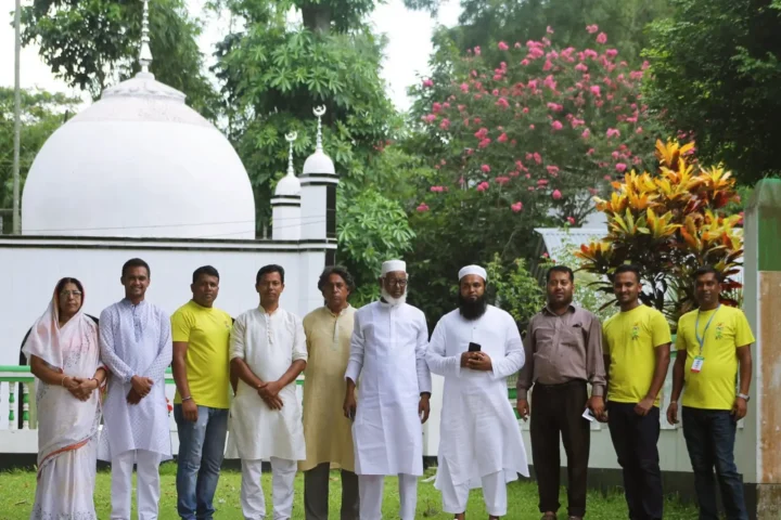 The Abul Khair Health Care team and volunteers gather before a health camp in 2019