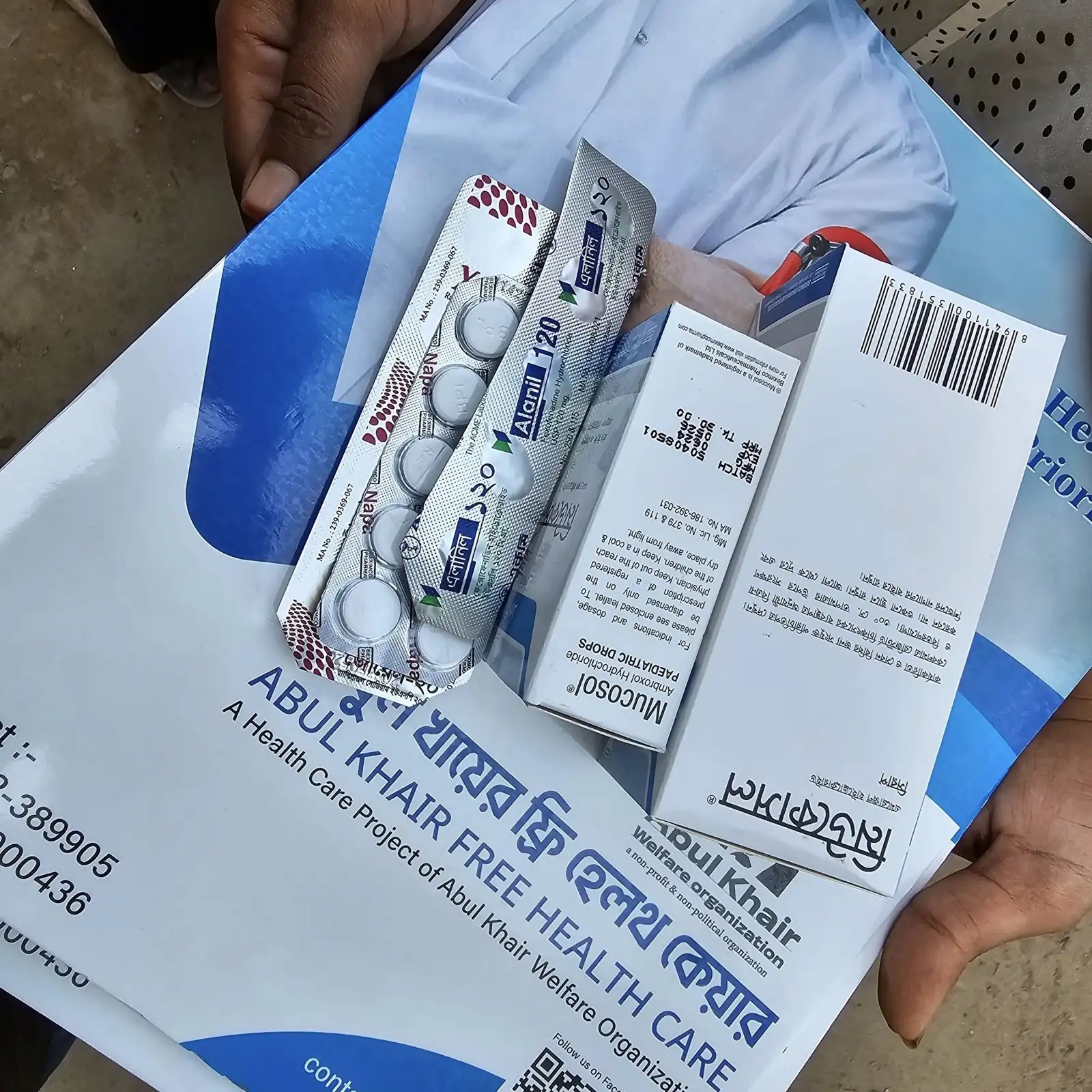 A pack of free medicine marked Abul Khair Free Health Care, handed to a patient at the Friday clinic